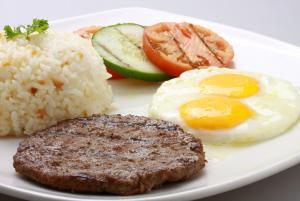 Garlic rice, Grilled tomato, sunny side up eggs